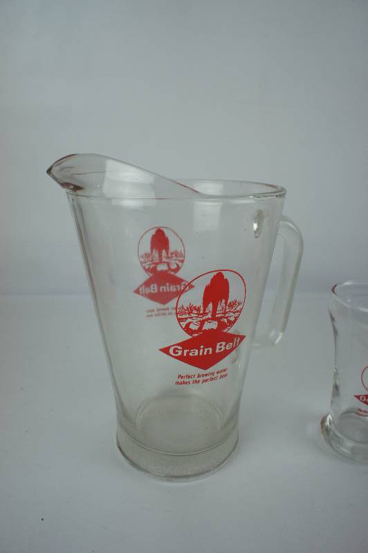 lot 157 image: Grain Belt Beer Serving Pitcher with Drinking Glass