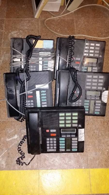 Bin of multi-line phones