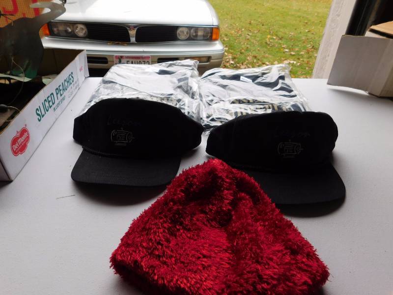couple of leeson motors hats and two Minnesota lottery t shirts new