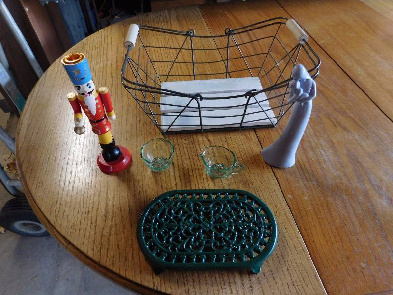 Home decor lot, wire basket, nutcracker, green glass cream and sugar plus more