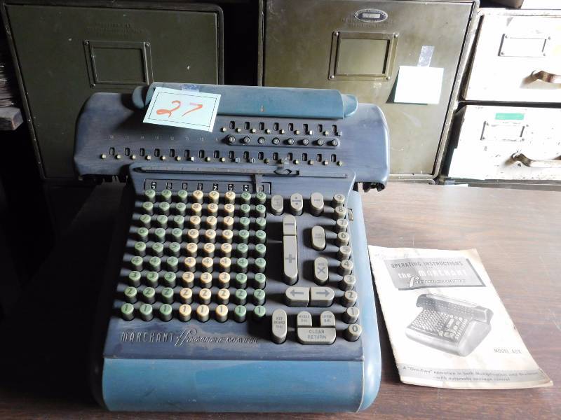 Vintage Marchant Figurematic calculating machine and operating instructions