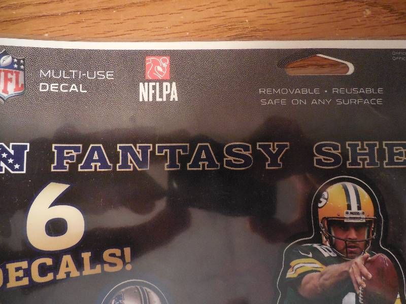 lot 17 image: NFL Decal Player Sheet of 12 Players - Rodgers, Wilson, Luck, Brady