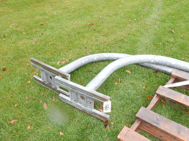 Basketball poles and backboards.