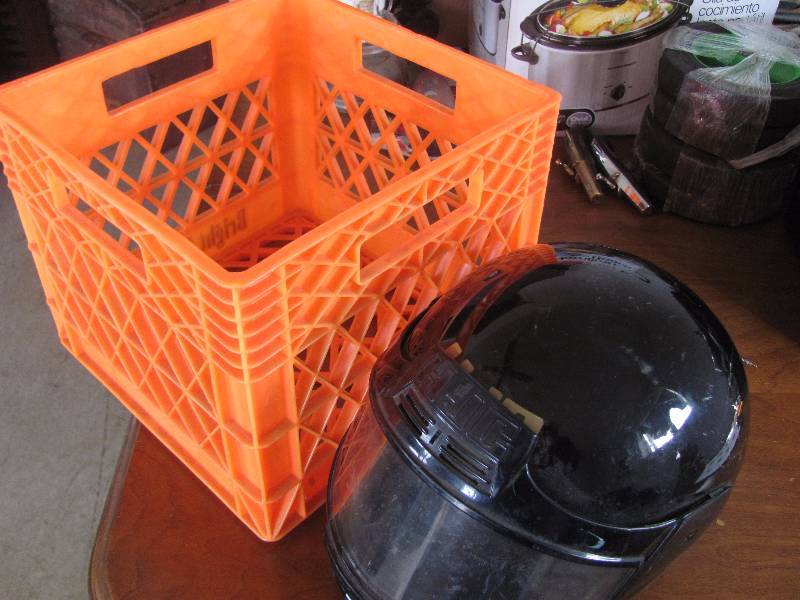 Milk crate and helmet