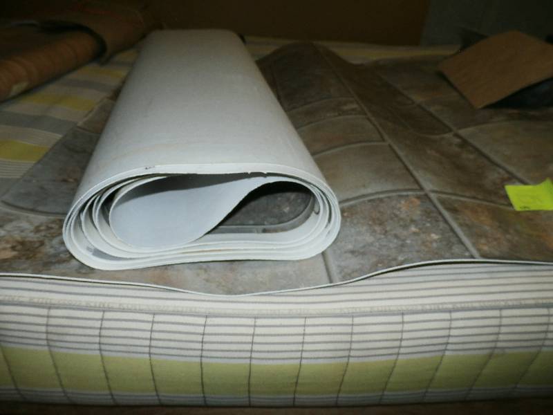 Pieces of Linoleum-Gray Colored Tile Look Pattern