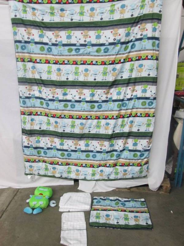 lot 56 image: Robot Reversible Bed Set - Twin