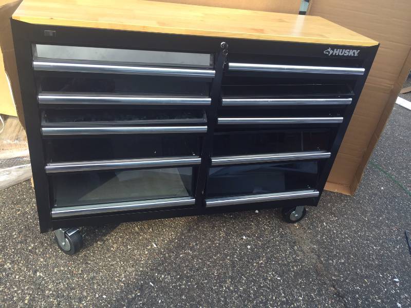 lot 205 image: 52 in. 10-Drawer Clear View Mobile Workbench with LED lighting and Solid Wood Top, Black