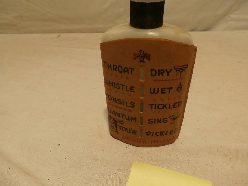 lot 54 image: Humorous Flask