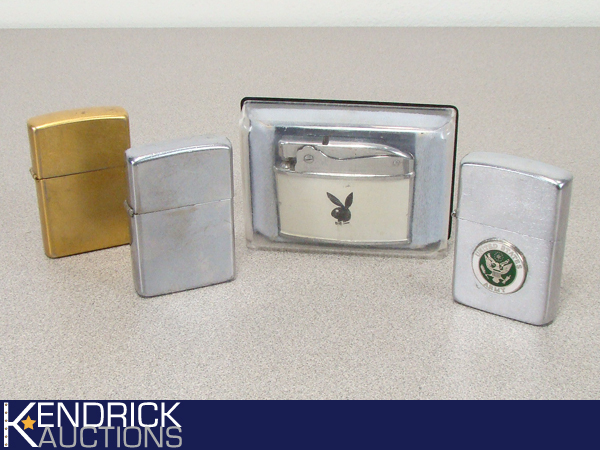 lot 33 image: 4 Vintage Collectible Zippo etc. Lighters