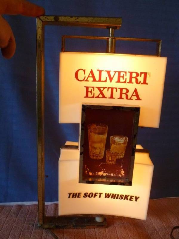 lot 7 image: Vintage Calvert Extra Mechanical Light Up Sign