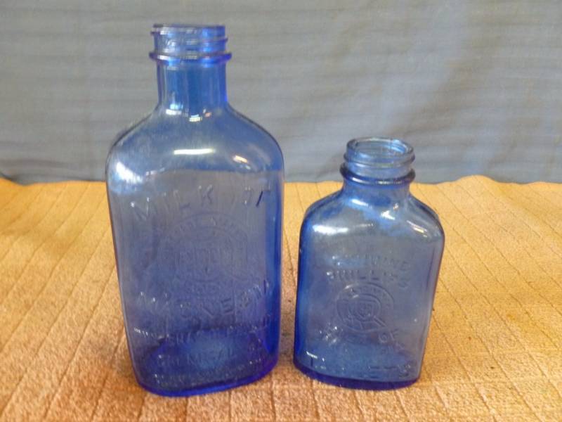lot 126 image: Cobalt Blue Glass Containers