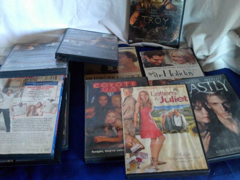 box of misc movie dvds