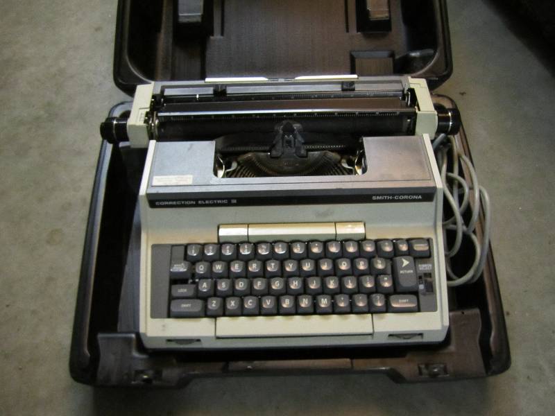 lot 2 image: Smith Corona electric typewriter in...