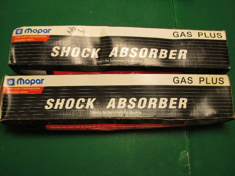 lot 37 image: 2 Mopar 04684681AB Shock absorbers...