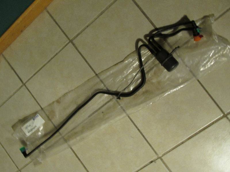 lot 49 image: Mopar 04809118AB fuel filter...