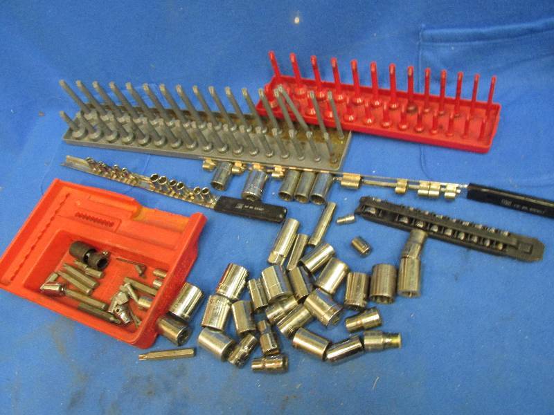 lot 113 image: Lot of assorted sockets, rails, and...