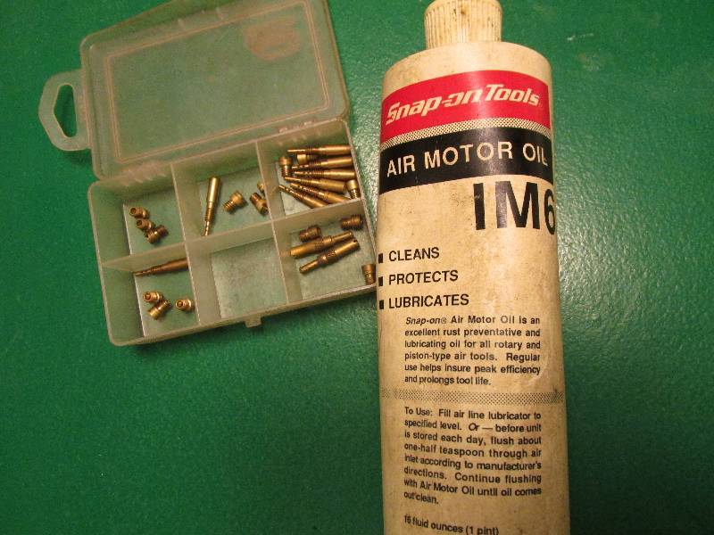 lot 139 image: Snap On air motor oil and specialty...