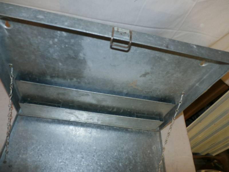 Galvanized shop desk that hangs on wall