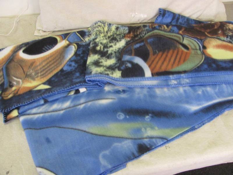 lot 51 image: Dolphins and Ocean Friends Soft Fleece Throw Set of 2