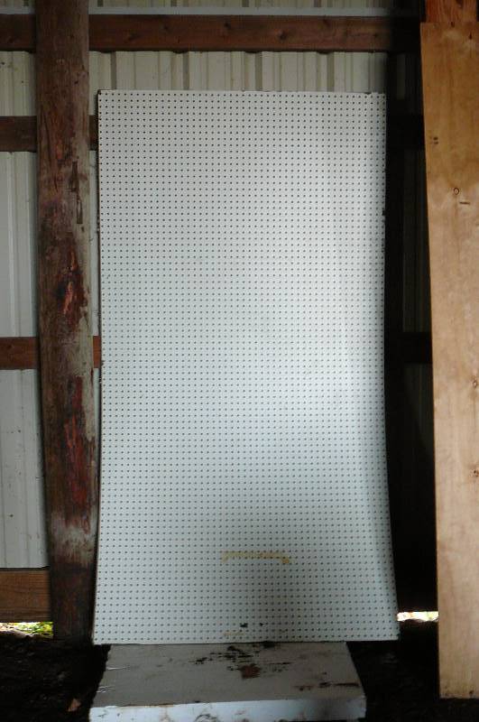 lot 28 image: 3 - 4x8 Painted Pegboard Panels