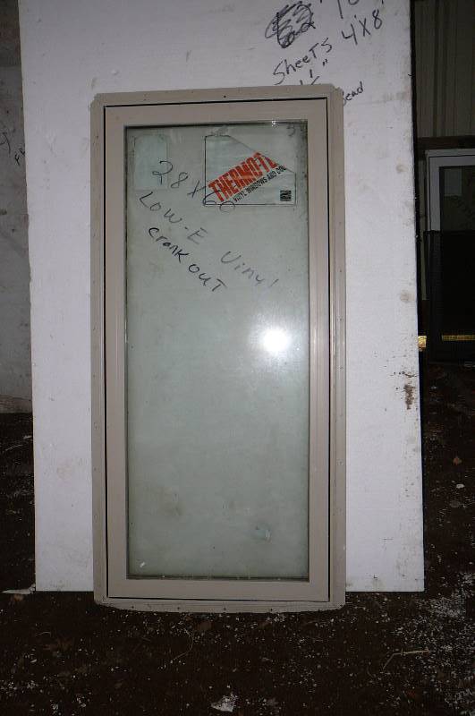 lot 68 image: 28 x 60 Low E Vinyl Crank out with screen Almond
