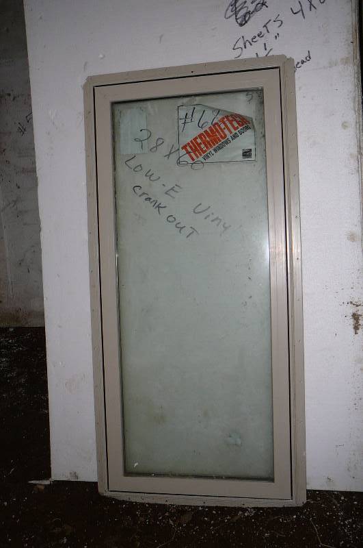 lot 69 image: 28 x 60 Low E Vinyl Crank out with screen Almond