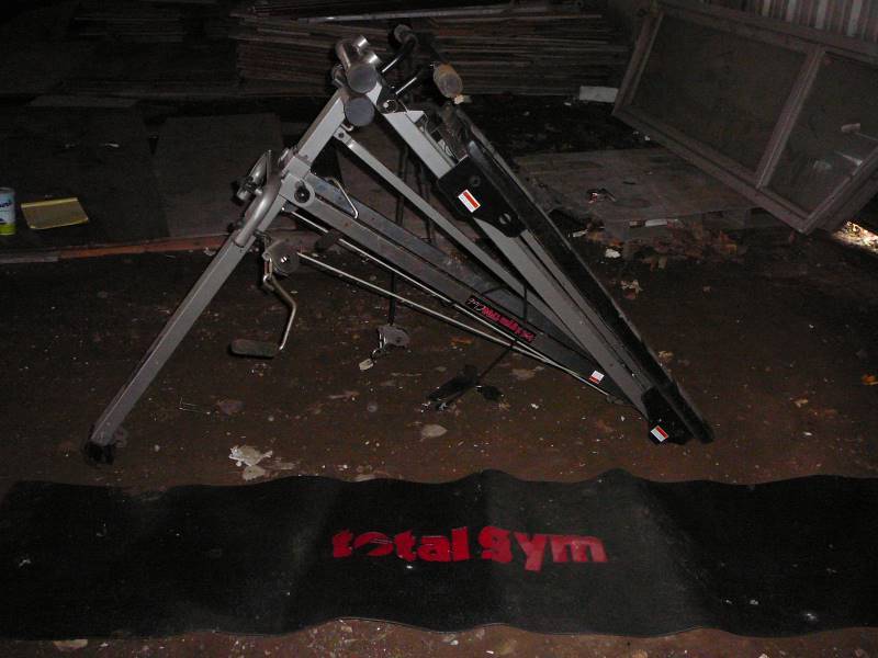 lot 106 image: Total Gym with mat