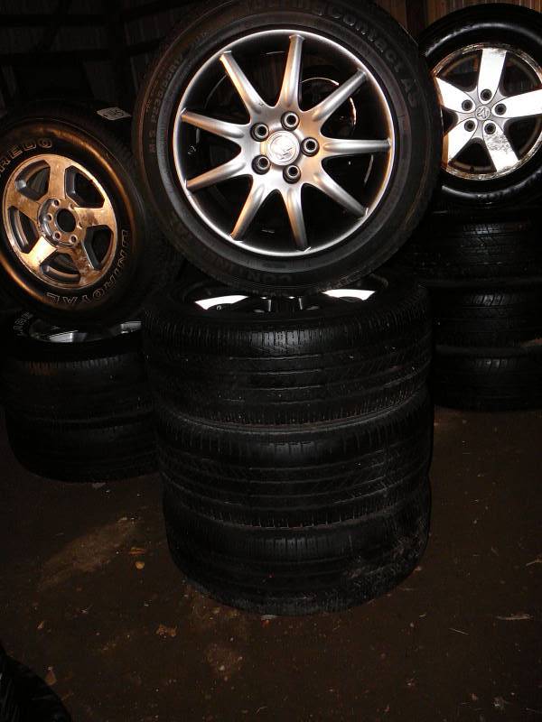 Tires Continental Touring Contact Mounted on 2007 Buick Lucerne Rims ( 2-Rims are Bad)