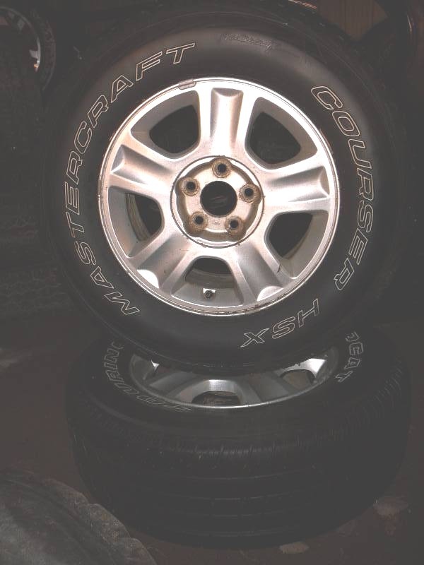 Tires Mastercraft courser HSX 95% Tread Mounted on 2004 Ford Escape Rims