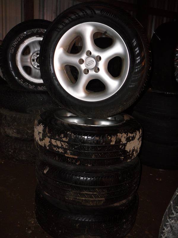 Tires Continental Coni-pro mounted on 2005 Pontiac Sunfire Alum rims 65% Tread