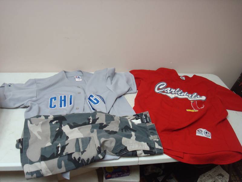 Pair Of Jerseys And Camo Shorts, Show Wear