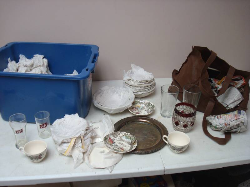 Bin With China And Dishes