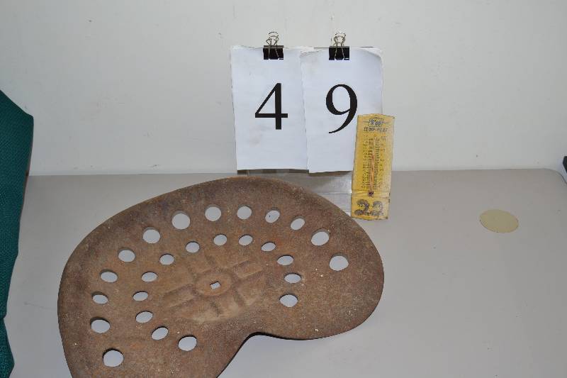 lot 49 image: tractor seat & thermometer