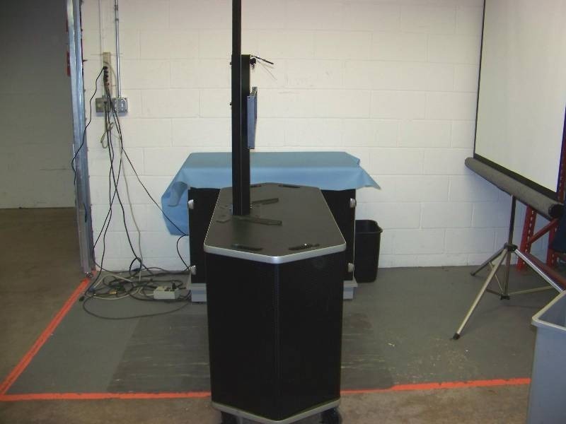 lot 14 image: Rolling AV (Audio Visual)  TV  Monitor Cart with Rack Area and Lockable Doors