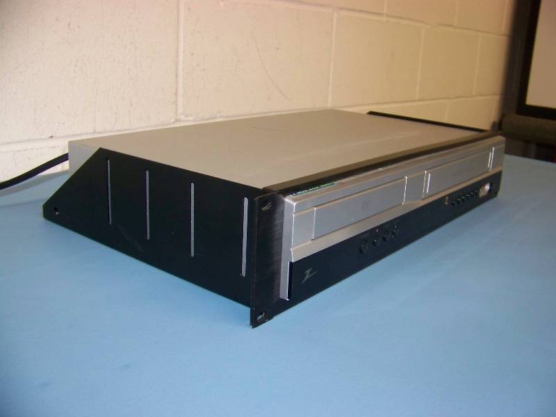 lot 54 image: Zenith, DVD  VCR Player Combination in Middle Atlantic Rack Shelf