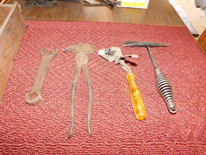 lot 46 image: old wooden drawer and vintage tools old fence tool, small pick axe, tractor tool