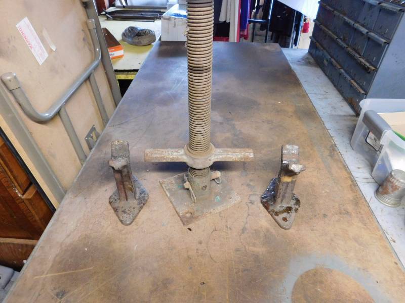 lot 40 image: large winding lifting tool and 2-cast iron jack rest stands