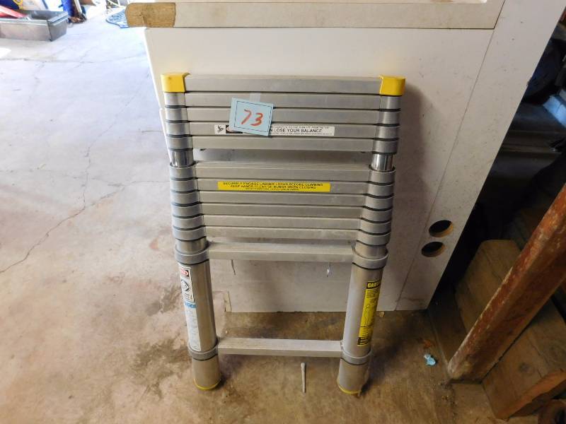 lot 73 image: Telesteps model 126 12 12 foot telescoping ladder Type II