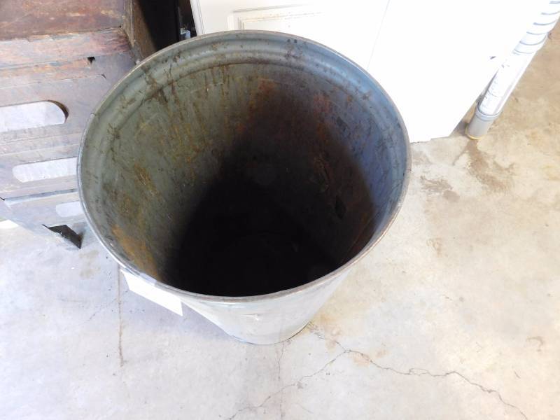 lot 86 image: tall vintage tin trash can rather unique can