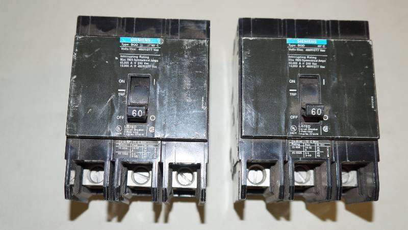lot 201 image: Qty 2 Siemens 60 Amp Type BQD 480Y277 VAC Interrupting Rating 3 Pole Bolt On Circuit Breakers