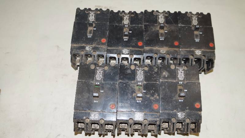 lot 338 image: Mixed Lot of 7 GE 3 Pole 20 & 40 Amp Circuit Breakers