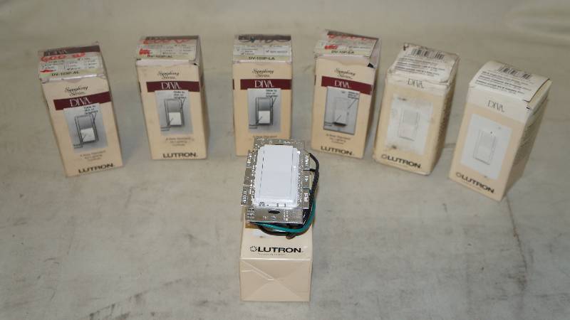 lot 384 image: Lot of 7 NIB Lutron White, Almond & Ivory 1000 Watt & 600 Watt Dimmers