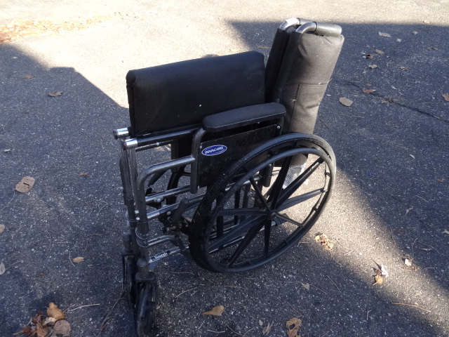 lot 33 image: invacare foldup wheel chair