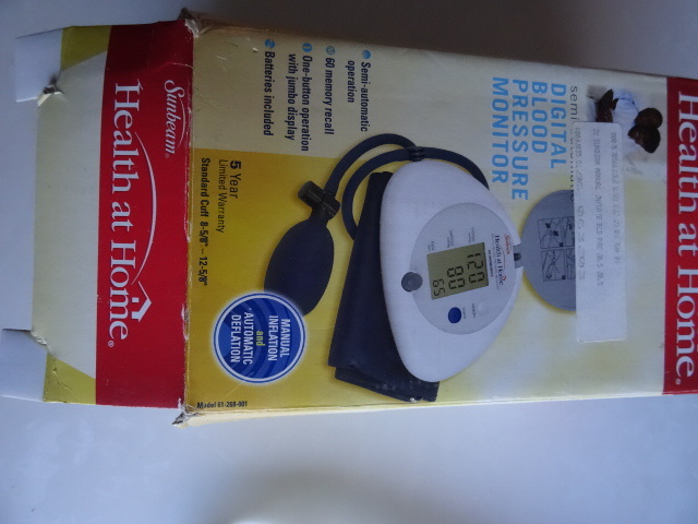 lot 48 image: sunbeam digital blood pressure monitor