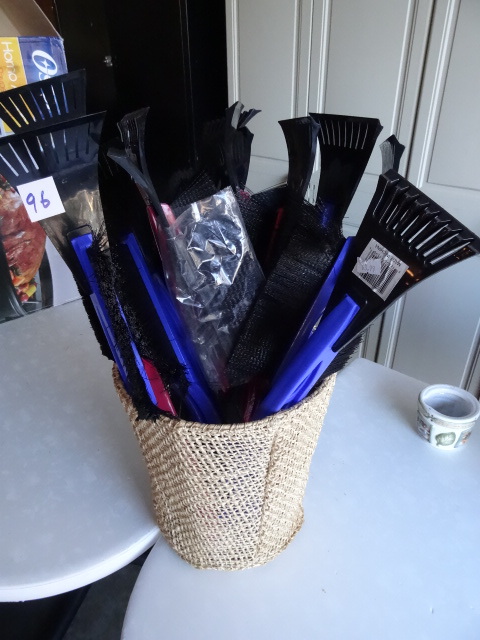 lot 96 image: basket full of ice scrapers