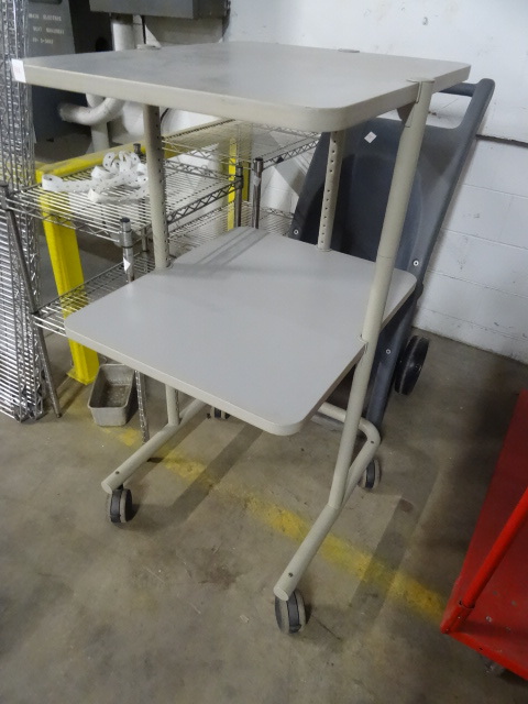 lot 232 image: 2 Tier Cart on Wheels 24 X 24 X 50