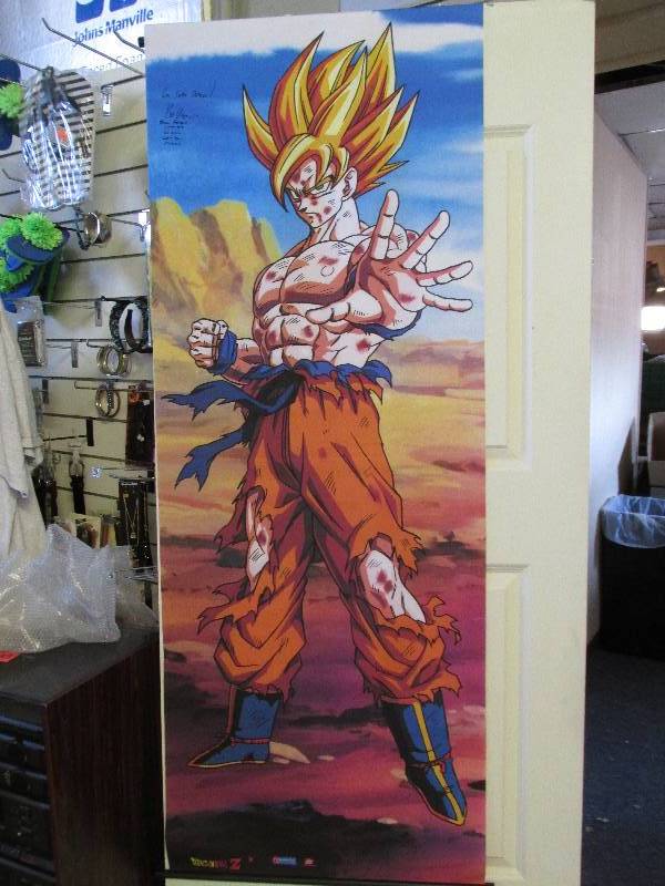 lot 12 image: signed Dragon ballZ roll up poster-...
