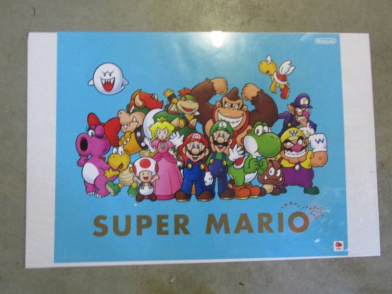 lot 14 image: Nintendo super mario poster with co...