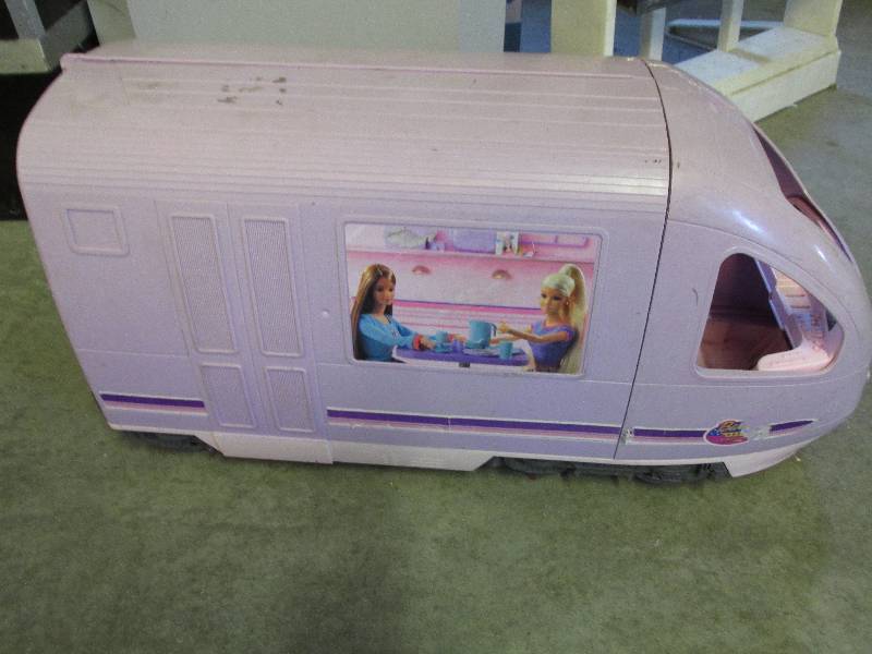 lot 19 image: Barbie camper on wheels - used, cou...