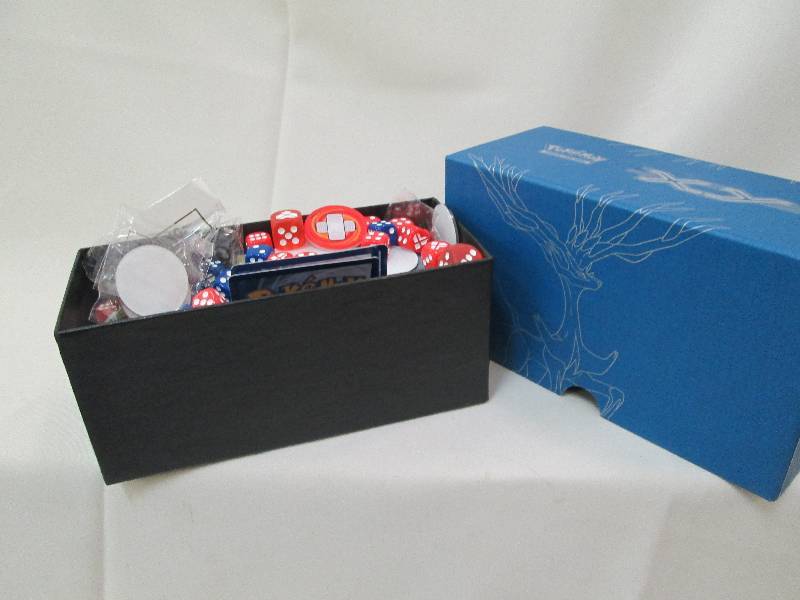 lot 40 image: Pokemon trading card game with dice...